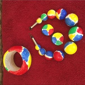 Paper-mâché necklace, bracelet, and earrings.